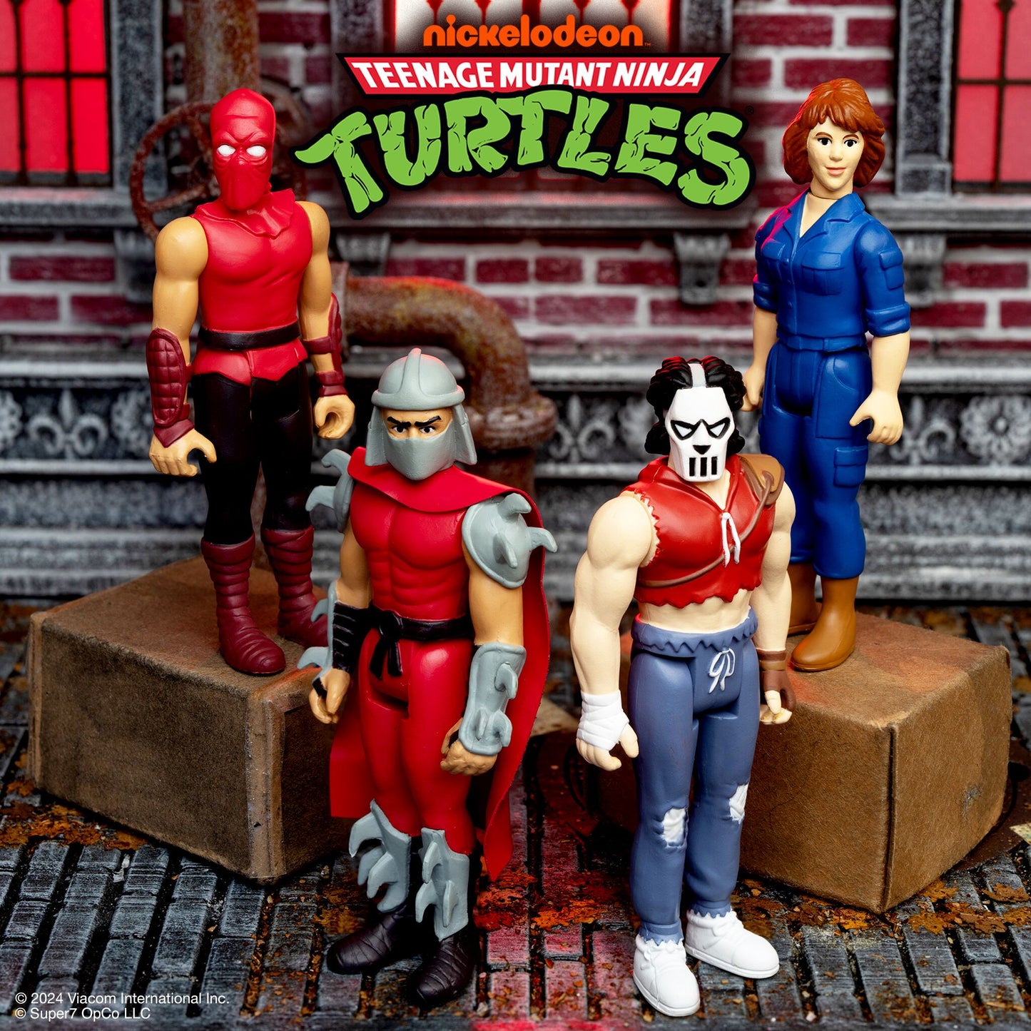 Super7 - TEENAGE MUTANT NINJA TURTLES REACTION FIGURES WAVE 11 - APRIL O'NEIL (COMIC COLOR)